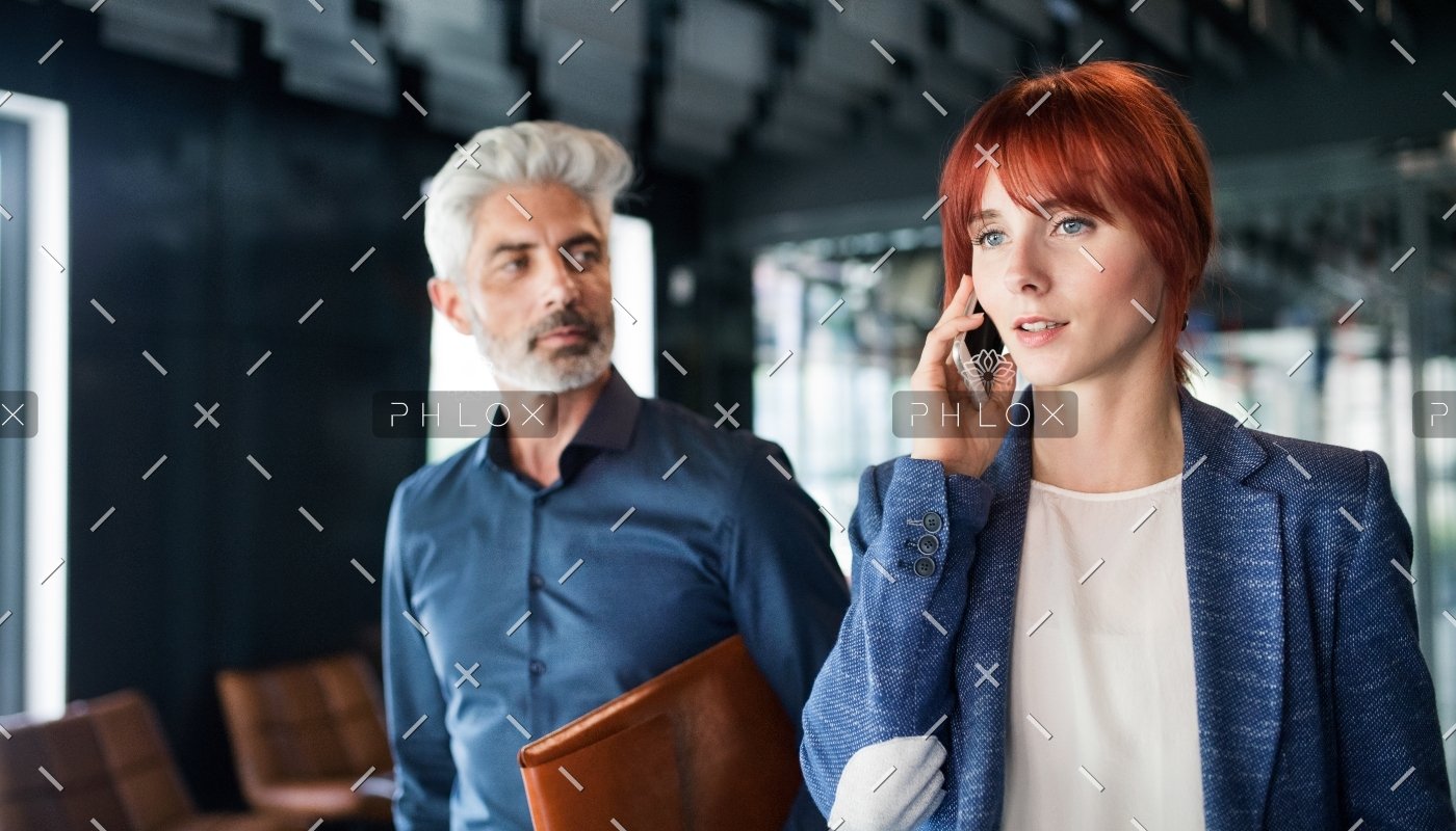 business-people-in-the-office-making-a-phone-call-PQZTHDY